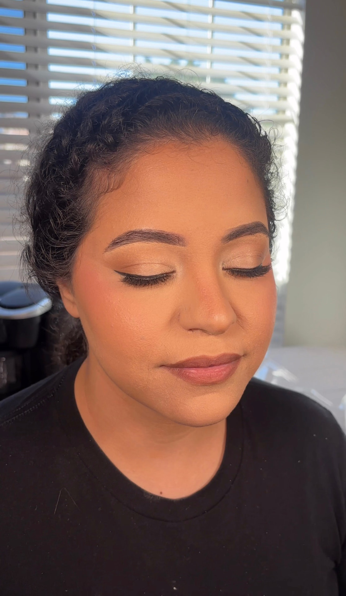 Natural soft glam makeup with glowing skin and winged liner