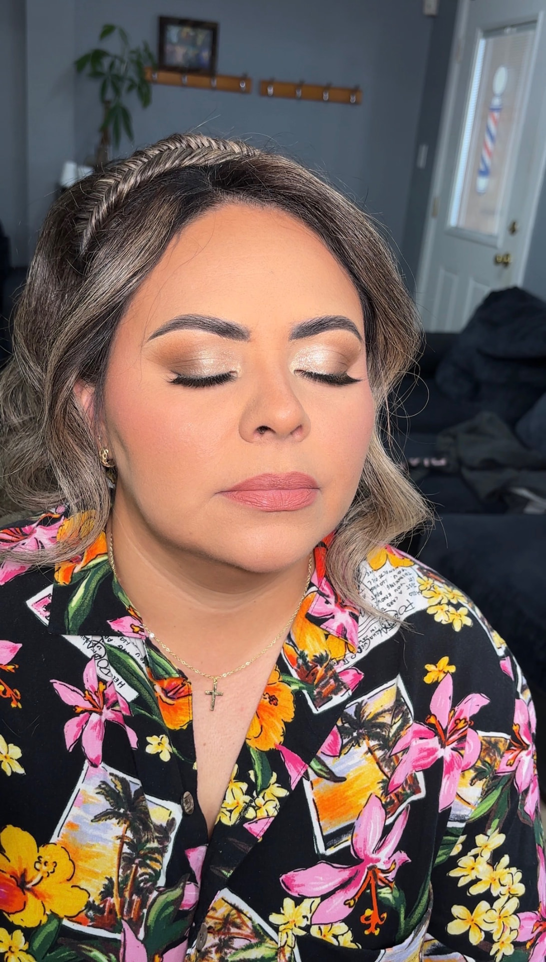 Full glam makeup with winged liner and nude lip